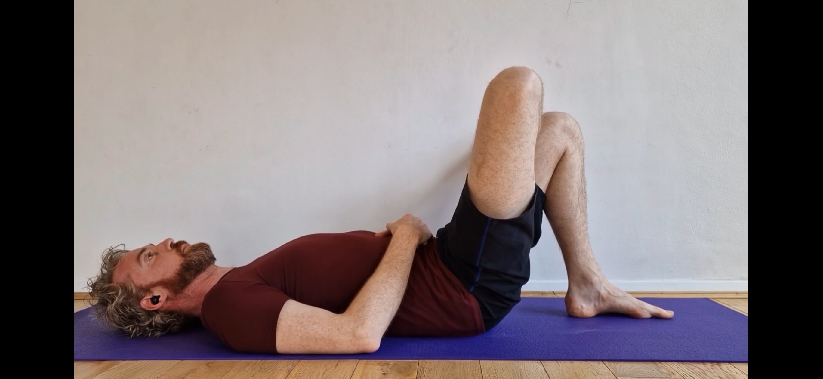 Place right ankle on left knee