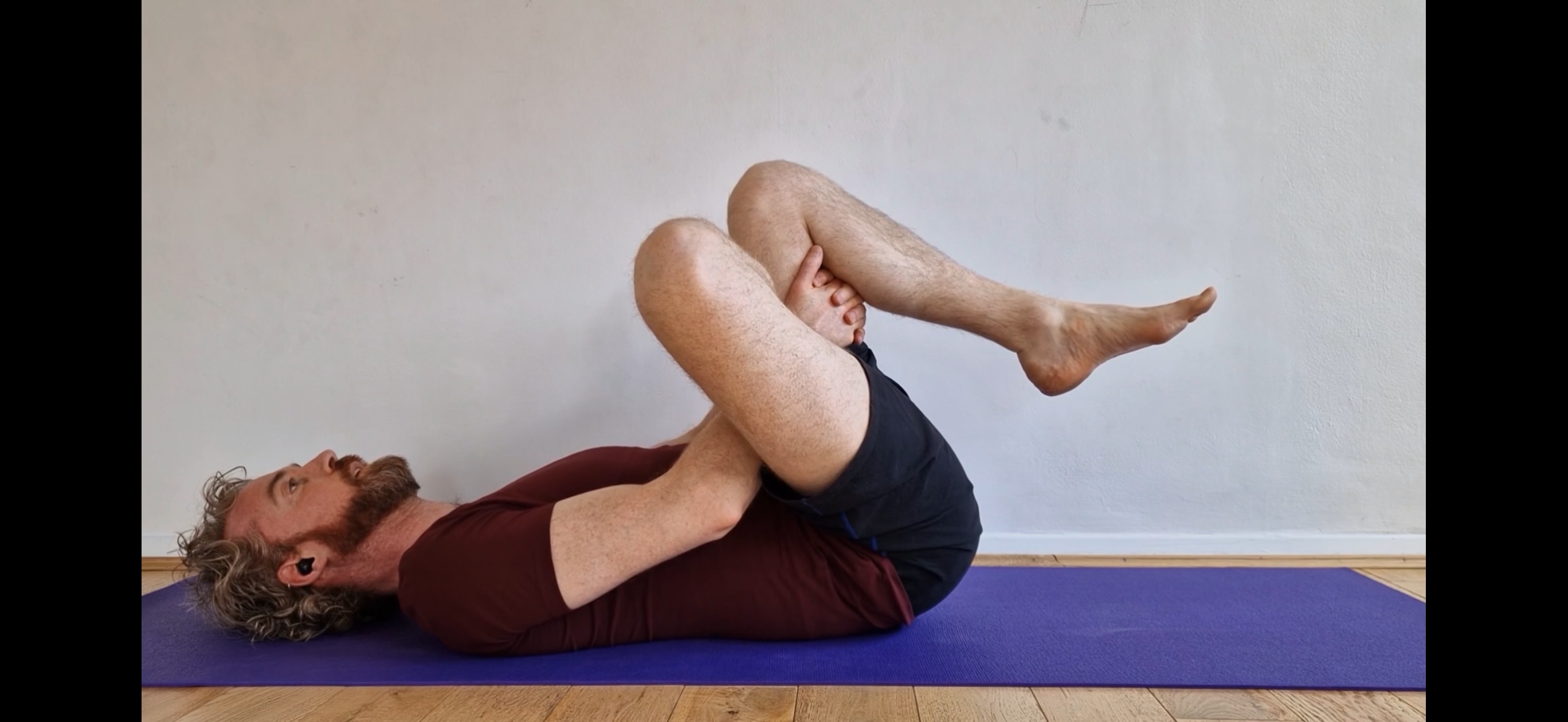 Pull left knee toward chest